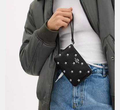 Coach Corner Zip Wristlet With Star Print in Black